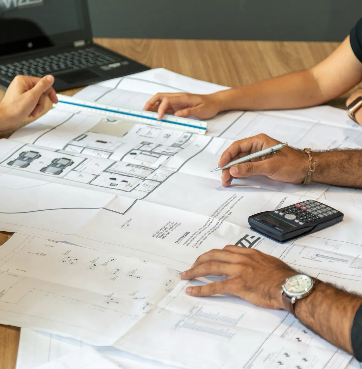 Architect drawing building plans for a renovation project